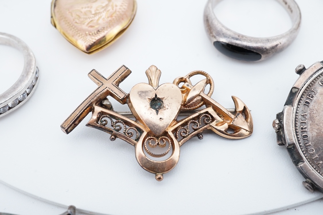 A small group of sterling, white metal and and other jewellery, including a charm bracelet, frog brooch, etc.